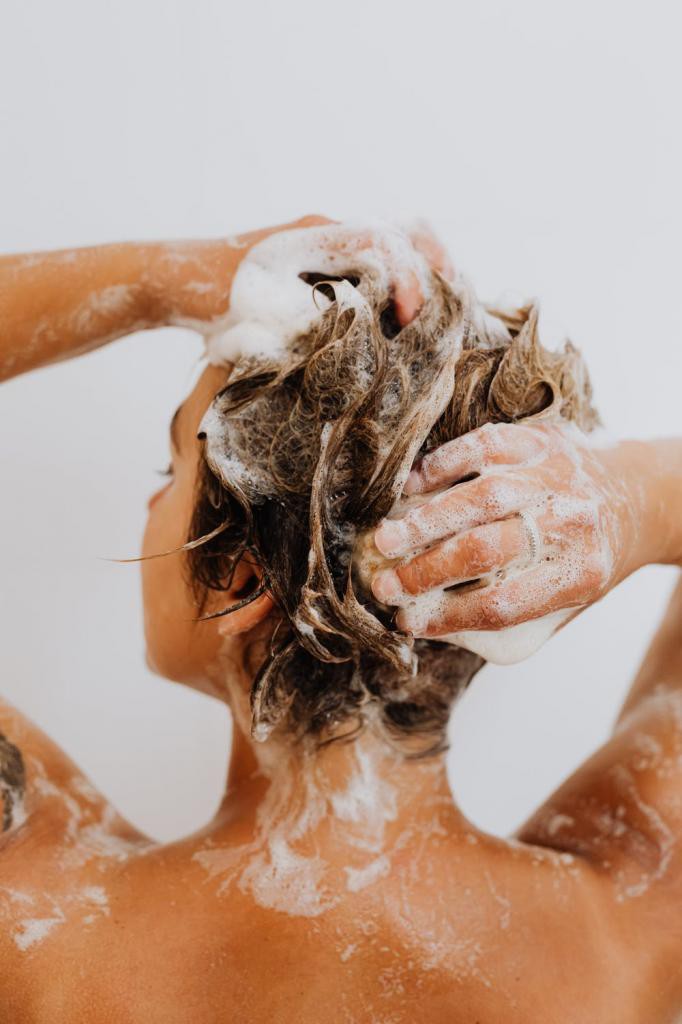 Woman With White Powder on Her Face