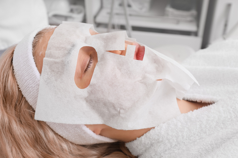 Woman undergoing procedure of carboxytherapy in beauty salon