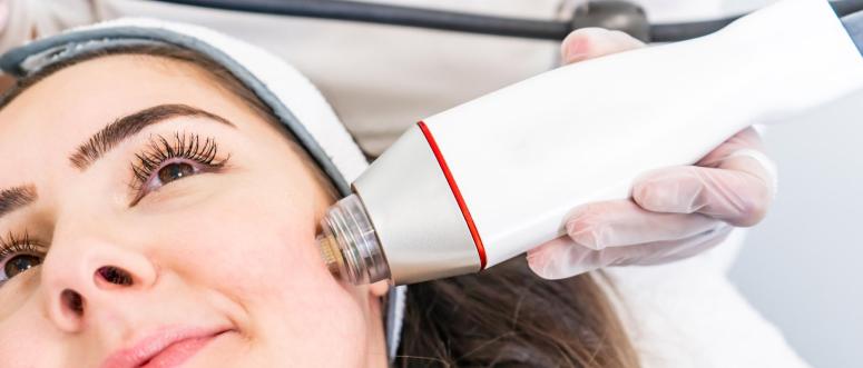 Shot of cosmetologist making mesotherapy injection with dermapen on face for rejuvenation on the spa center Shot of cosmetologist making mesotherapy injection with dermapen on face for rejuvenation on the spa center