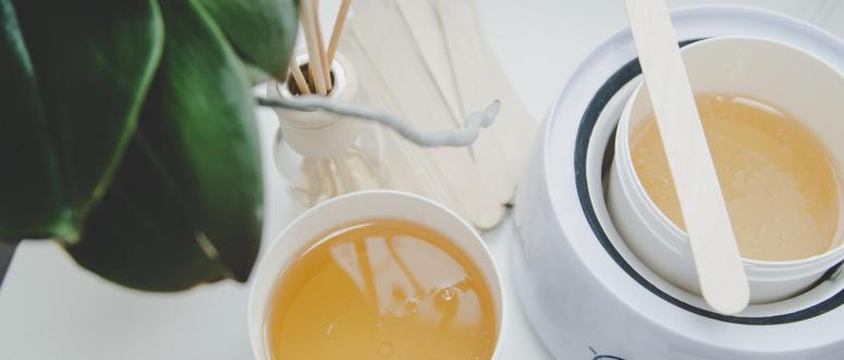 The concept of depilation and beauty is sugar paste or hair removal wax The concept of depilation and beauty is sugar paste or hair removal wax
