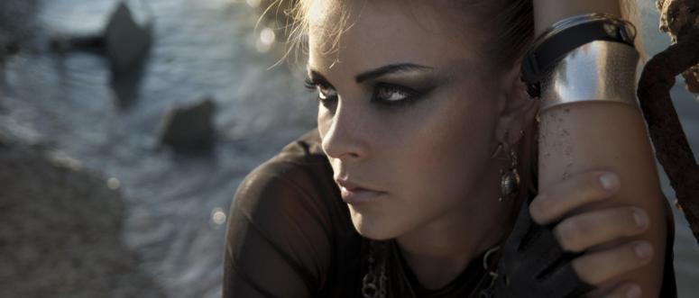 beautiful girl with intensive makeup in a rock style beautiful girl with intensive makeup in a rock style