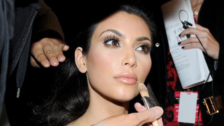 Kim Kardashian has become synonymous with cutting-edge style and sophisticated makeup in beauty and fashion. Her iconic looks have inspired a global following eager to learn the secrets behind her flawless beauty regimen. This comprehensive Kim Kardashian makeup tutorial is designed to guide you through the process, ensuring you can quickly achieve Kim's signature style.  Understanding Kim Kardashian's Signature Makeup Look Kim Kardashian's makeup emphasizes a flawless base, dramatic eyes, sculpted cheeks, and nude lips. This balance of bold and subtle elements is critical to recreating her look.  Foundation: Flawless Canvas A smooth, even base is essential. Kim's look starts with a high-coverage foundation, which creates a perfect canvas.  Contour and Highlight: The Art of Definition Contouring and highlighting are staples of Kim's makeup routine, used to define her facial structure and create a luminous complexion.  Eyes: Bold and Beautiful From smoky shadows to perfect winged liners and lush lashes, Kim's eye makeup is always a statement.  Lips: Subtly defined Kim often chooses creamy nude lipsticks and glosses to complete the look and add the right touch of elegance.  Step-By-Step Kim Kardashian makeup tutorial Follow this step-by-step Kim Kardashian makeup tutorial to emulate her glamorous makeup look, whether for a day out or a special night in.  Start with skin preparation Hydrate your skin with a quality moisturiser to keep it plump and smooth.  Apply a primer to create a seamless base and enhance the longevity of your makeup.  Foundation and Concealer For a flawless complexion, choose a full-coverage foundation that blends well with the skin.  Brighten under the eyes and hide imperfections with a concealer that blends for a natural finish.  Masterful contouring and highlighting Sculpt your face with contour shades under the cheekbones, along the jawline and at the temples.  Apply highlighter to the high points of your face, such as the cheekbones, brow bone, and nose bridge.  Dramatic eye makeup Start with a neutral base on the eyelids and build with darker shades for depth and dimension.  Define your eyes with a gel or liquid eyeliner and extend for that signature Kim K wing.  Finish with volumising mascara or false lashes for added drama.  Perfect brows Fill and shape your brows to frame your face, keeping them full yet polished.  Nude lips for a finishing touch Line your lips with a nude pencil, then fill in with a matching lipstick or gloss for a plump, subtle look.  Kim Kardashian makeup tips for perfection Seamless Blending: Invest time blending your makeup to avoid harsh lines, especially with contour and eyeshadow.  Buildable coverage: Start light with contour and foundation and build to the desired intensity for a more natural look.  Long-lasting finish: Use a setting spray to keep your makeup fresh and in place throughout the day or night.  Elevate your beauty routine with MOBILESTYLES.  Achieving Kim Kardashian's glamorous makeup involves blending techniques with the right products. But beyond the tutorials, true beauty comes from feeling confident and looking your best. That's where MOBILESTYLES comes in, offering on-demand beauty services to meet your every need. From makeup sessions that channel the Kim K vibe to personalised beauty treatments, MOBILESTYLES professionals are at your service to make you look and feel fabulous. Download the app, book your appointment, and let MOBILESTYLES bring the magic of celebrity-inspired beauty right to your door.