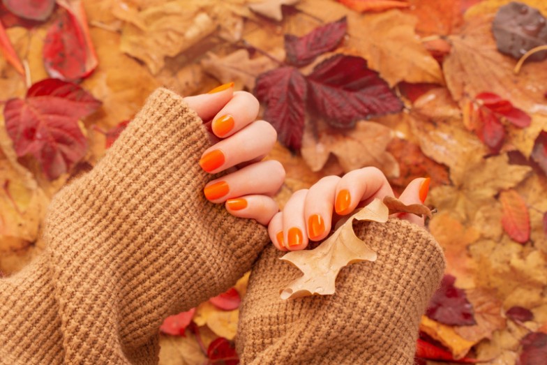 As the leaves change color and the air turns crisp, it's the perfect time to update your manicure with the vibrant and cozy shade of orange. Orange fall nails are a fun and stylish way to capture the essence of autumn. From pumpkin spice tones to burnt orange hues, there's a perfect orange for everyone. Let's explore the ultimate guide to rocking orange fall nails this season! Orange fall nails are more than just a trendy color choice; they're a celebration of the season. The warm and inviting shades of orange reflect the beautiful changes in nature, making them ideal for autumn. Whether you're sipping on a pumpkin spice latte or taking a scenic walk through fallen leaves, orange nails add a touch of seasonal charm to your look. Orange symbolizes warmth, creativity, and enthusiasm. It's a color that brings joy and energy, perfectly aligning with the festive spirit of fall. From bright and bold to soft and subtle, orange nails can be adapted to suit any style or occasion. Top Trends in Orange Fall Nails Pumpkin Spice Perfection One of the most popular trends for fall is the pumpkin spice manicure. This warm, cozy shade of orange is reminiscent of everyone's favorite autumn beverage. It's perfect for adding a touch of seasonal fun to your nails. Pumpkin spice nails are versatile and can be dressed up or down. Pair them with a cozy sweater for a casual day out, or add some gold accents for a more glamorous look. Matte Magic Matte orange nails are a chic and modern twist on the classic manicure. This velvety finish gives your nails a sophisticated look that's perfect for fall. Matte nails are great for those who want a stylish yet understated appearance. The matte finish softens the brightness of orange, making it more wearable for everyday occasions. It's a subtle way to embrace the season without being too bold. Glitter and Glam Add some sparkle to your orange fall nails with glitter accents. Whether it's a full glitter nail or just a touch of shimmer, this trend is sure to catch the light and add a festive touch to your look. Glitter nails are perfect for special occasions and holiday parties. They bring a playful and fun element to your manicure, making your nails the center of attention. Nail Art Ideas for Orange Fall Nails Ombré Effects Ombré nails blend two or more colors seamlessly. For a fall-inspired look, try mixing orange with shades of yellow or red. This gradient effect is stunning and perfect for the season. Ombré nails create a unique and eye-catching design. The smooth transition between colors adds depth and dimension to your manicure, making it truly stand out. Leaf Designs Embrace the autumn theme with delicate leaf nail art. A gold or copper leaf design over an orange base is both festive and stylish. It’s a subtle nod to the fall foliage. Leaf designs are perfect for adding a seasonal touch to your nails. They are intricate and elegant, making your manicure look professionally done. Geometric Patterns For a modern twist, incorporate geometric patterns into your orange fall nails. Think triangles, lines, and dots in contrasting colors like black or white. This design is edgy and contemporary. Geometric patterns add a bold and artistic element to your nails. They are perfect for those who love a modern and minimalist aesthetic. Maintaining Your Orange Fall Nails To keep your orange fall nails looking fresh, follow these simple tips: Moisturize Regularly: Use cuticle oil and hand cream to keep your nails and skin hydrated. Avoid Harsh Chemicals: Wear gloves when cleaning or doing dishes to protect your manicure. Touch Up as Needed: Keep your orange polish handy for quick touch-ups to prevent chips from showing. Conclusion Orange fall nails are a fantastic way to celebrate the autumn season with vibrant style. From pumpkin spice perfection to trendy matte finishes and dazzling glitter, there’s a look for everyone. With a bit of creativity and the right tools, you can achieve salon-quality nails at home. Ready to get your orange fall nails on point? Book an appointment with a MOBILESTYLES beauty professional today! MOBILESTYLES brings the salon experience to you, so you can enjoy gorgeous nails without leaving the comfort of your home. Embrace the season and treat yourself to a stunning manicure—download the MOBILESTYLES app and schedule your appointment now!