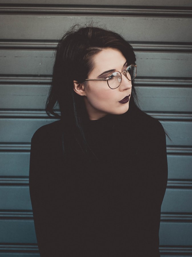 woman standing near wall