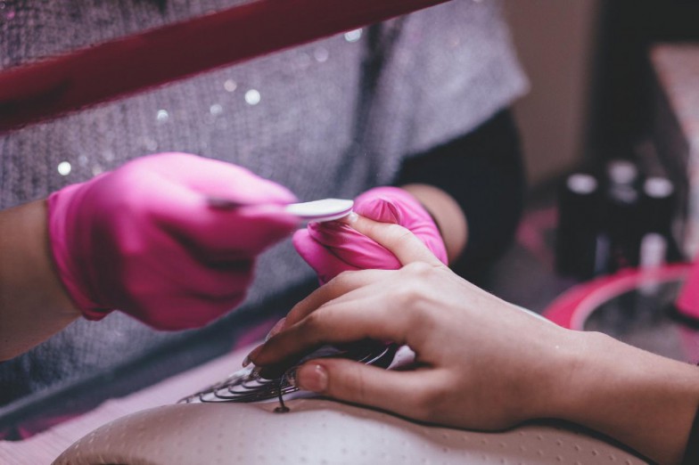 Close-up of Woman Having Manicure Done