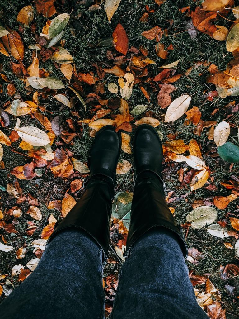 Person Wearing Pair Of Black Boots