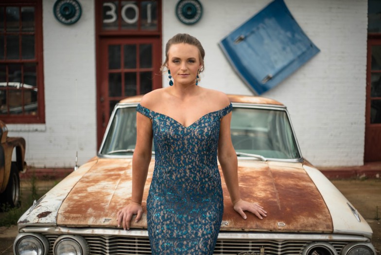 woman wearing blue off-shoulder dress photo