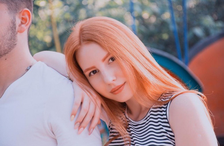 woman wearing black and white tank top photo