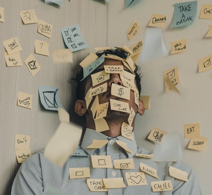 people sitting on chair with brown wooden table